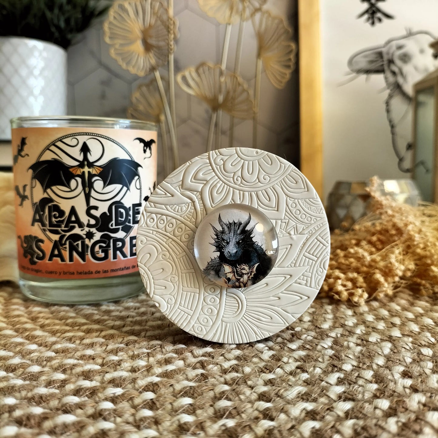 Tapa de la vela aromatica literaria Alas de sangre